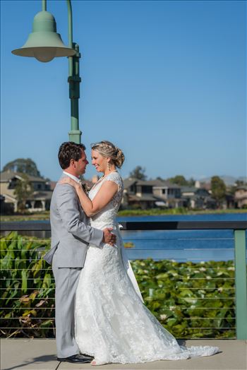 Cypress Ridge Pavilion Wedding Photography by Mirror's Edge Photography in Arroyo Grande California.  Bride and room by the lake and lamp post