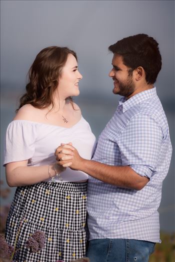 Sarah Williams of Mirror's Edge Photography, a San Luis Obispo Wedding and Engagement Photographer, captures Kara-Leigh and Deaven's amazing Engagement Photography Session at the Dinosaur Caves Park in Pismo Beach California. Sweet couple.