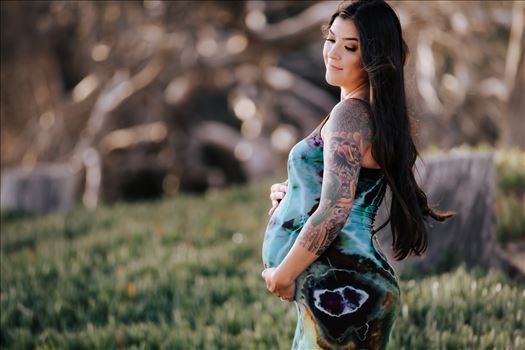 Sarah Williams of Mirror's Edge Photography, a San Luis Obispo County Wedding, Luxury Boudoir and Maternity Photographer captures Ali Marie and Cody's Maternity Session in Pismo Beach. Beautiful mother with baby bump pregnancy
