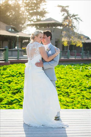 Cypress Ridge Pavilion Wedding Photography by Mirror's Edge Photography in Arroyo Grande California.  Bride and Groom on the dock