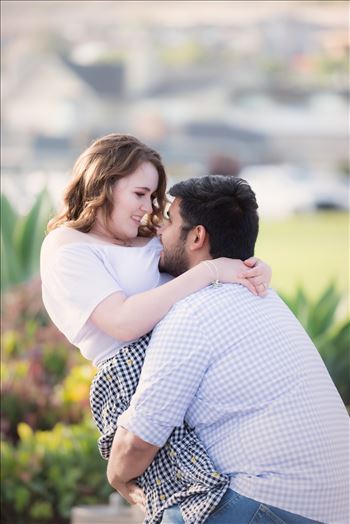 Sarah Williams of Mirror's Edge Photography, a San Luis Obispo Wedding and Engagement Photographer, captures Kara-Leigh and Deaven's amazing Engagement Photography Session at the Dinosaur Caves Park in Pismo Beach California. The love dip.
