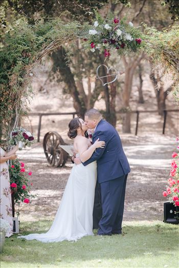 Mirror's Edge Photography captures Madison and Stephen's Wedding at Case de Alvarez in Arroyo Grande, California. The wedding kiss