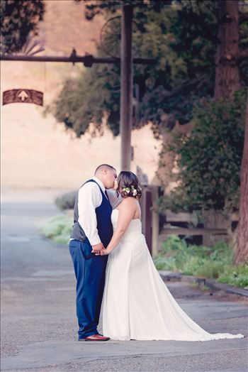Mirror's Edge Photography captures Madison and Stephen's Wedding at Case de Alvarez in Arroyo Grande, California. Bride and Groom at venue gates, romantic.