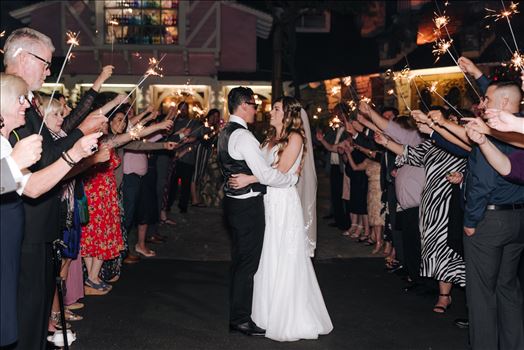 Mirror's Edge Photography, a San Luis Obispo Wedding and Engagement Photographer, captures Rashel and Brian's Wedding Day at the Madonna Inn in San Luis Obispo. Sparkler exit.