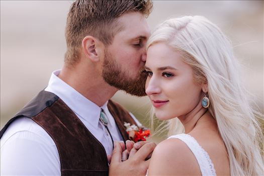 Pismo Beach Wedding in San Luis Obispo County by Mirror's Edge Photography.  Gorgeous windswept beach wedding vibes with a country and boho flair.  Bride and Groom on beach