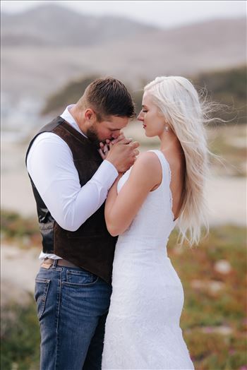 Mirror's Edge Photography, a San Luis Obispo County Wedding and Engagement Photographer, captures Sarah and Jeremy's intimate wedding on Pismo State Beach in Grover Beach, California.  Bride and Groom love and tenderness with pismo in the background