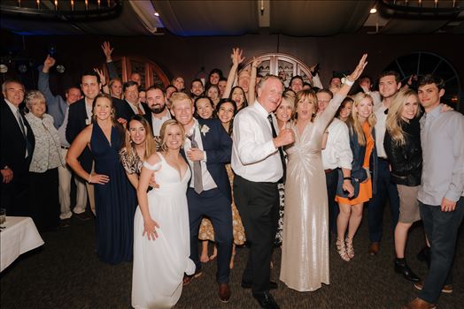 Sarah Williams of Mirror's Edge Photography, a San Luis Obispo Wedding and Engagement Photographer, captures Ryan and Joanna's wedding at the iconic Windows on the Water Restaurant in Morro Bay, California.  Reception party into the night