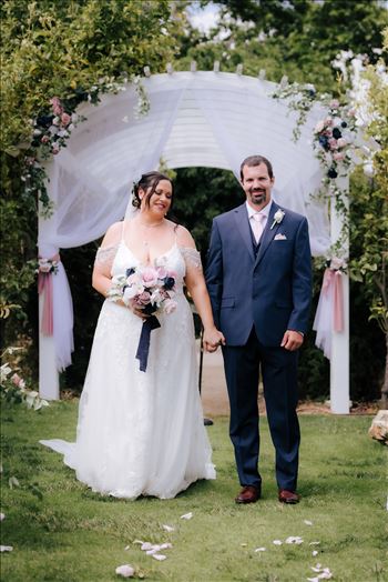 Mirror's Edge Wedding Photography, a San Luis Obispo and Santa Barbara County photographer capture the Nagy's Madonna Inn Wedding. Intimate Secret Garden Ceremony.